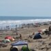 La costa, llena de gente en el arranque del certamen pesquero