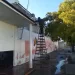 Comienza la renovación de la Escuela Nº 15 con el hidrolavado de paredes exteriores